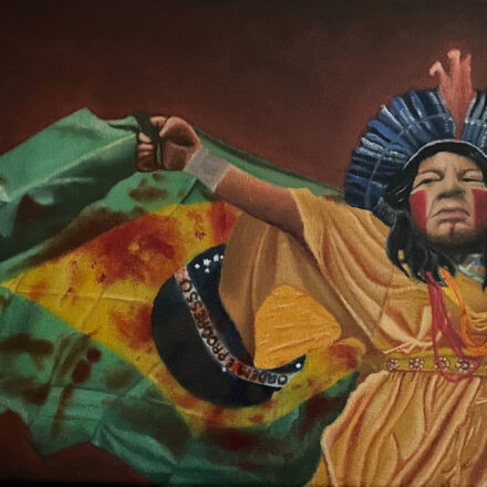 Sônia Guajajara e a bandeira do Brasil manchada de sangue
